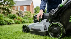 Close-up technical illustration of the single-lever central height adjustment on an EGO cordless mower, indicating various deck height settings from 20mm to 80mm.