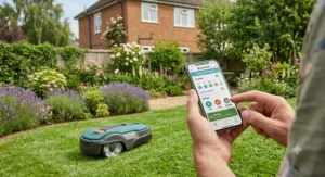A homeowner using a smartphone app to schedule and control a smart robot lawn mower.