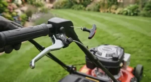 Detailed view of the starter cord and drive lever on a high-quality self-propelled lawn mower.