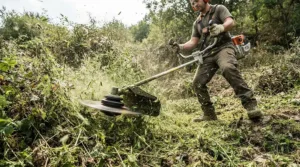 A high-torque cordless strimmer for long grass powering through thick weeds and dense vegetation.